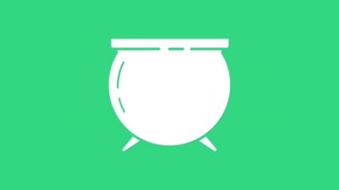 Beyaz Cadı kazan simgesi yeşil arkaplanda izole edildi. Aziz Patrick gününüz kutlu olsun. 4K Video hareketli grafik canlandırması