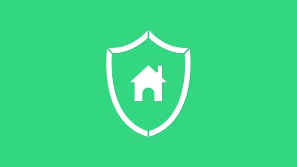 Vita huset med sköld ikon isolerad på grön bakgrund. Försäkringskoncept Säkerhet, skydd, skydd, skyddskoncept. 4K Video motion grafisk animation — Stockvideo