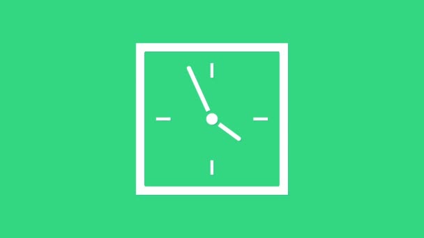 白い時計のアイコンは緑の背景に隔離された。時間の象徴だ。4Kビデオモーショングラフィックアニメーション — ストック動画