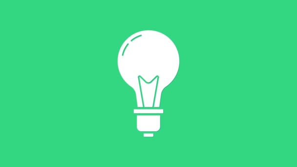 Vit glödlampa med begreppet idé ikon isolerad på grön bakgrund. Energi och idé symbol. Inspiration koncept. 4K Video motion grafisk animation — Stockvideo