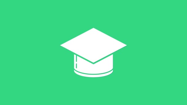 Icono blanco de la tapa de graduación aislado sobre fondo verde. Sombrero de graduación con icono de borla. Animación gráfica de vídeo 4K — Vídeo de stock