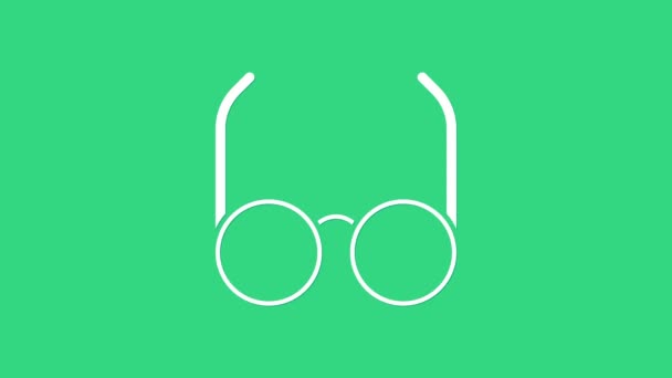 Ícone de óculos brancos isolado no fundo verde. Símbolo de quadro de óculos. Animação gráfica em movimento de vídeo 4K — Vídeo de Stock