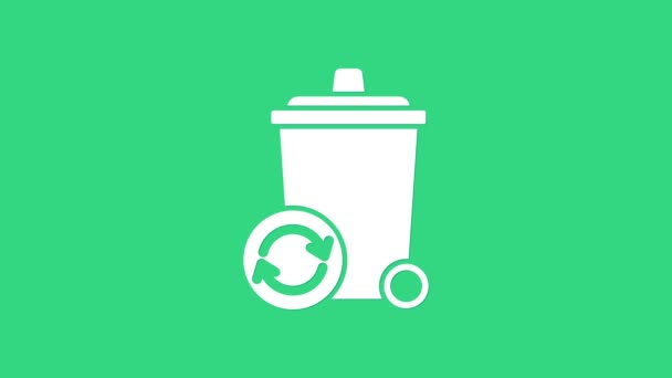 緑の背景に隔離されたリサイクルシンボルアイコンとホワイトごみ箱。ゴミはアイコンになる。ゴミのゴミ箱の看板。リサイクルバスケットのサイン。4Kビデオモーショングラフィックアニメーション — ストック動画