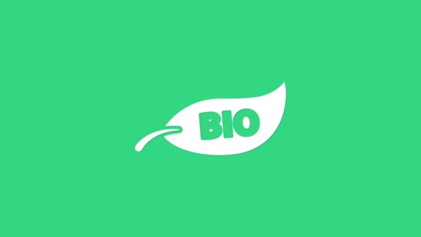 Vit Leaf Bio symbol ikon isolerad på grön bakgrund. Banner, etikett, etikett, logotyp, klistermärke för miljögrönt. 4K Video motion grafisk animation — Stockvideo