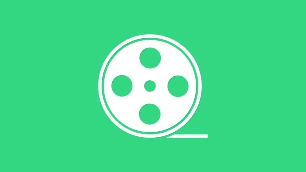 White Film reel pictogram geïsoleerd op groene achtergrond. 4K Video motion grafische animatie — Stockvideo