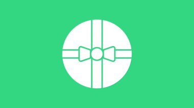 Yeşil arkaplanda beyaz hediye kutusu simgesi izole edildi. Mutlu Noeller ve mutlu yıllar. 4K Video hareketli grafik canlandırması