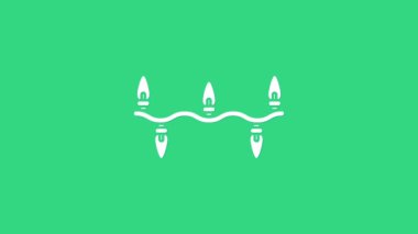 Beyaz Noel ışıkları ikonu yeşil arka planda izole edilmiş. Mutlu Noeller ve mutlu yıllar. 4K Video hareketli grafik canlandırması