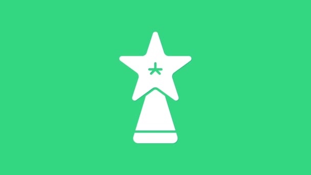 White Christmas star icon isolated on green background. Merry Christmas and Happy New Year. 4K Video motion graphic animation — Stock Video