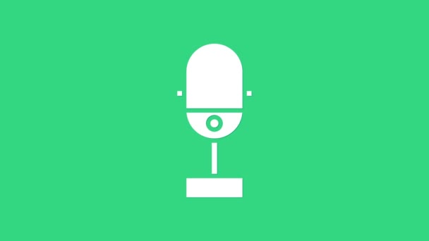 Λευκό εικονίδιο μικροφώνου απομονωμένο σε πράσινο φόντο. Στο μικρόφωνο του ασυρμάτου. Υπογραφή ομιλητή. 4K Γραφική κίνηση κίνησης βίντεο — Αρχείο Βίντεο