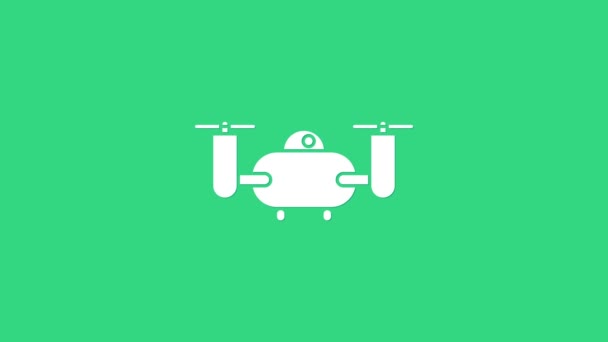 Drone blanco volando con el icono de la cámara de vídeo de acción aislado sobre fondo verde. Quadrocopter con video y el símbolo de la cámara fotográfica. Animación gráfica de vídeo 4K — Vídeos de Stock