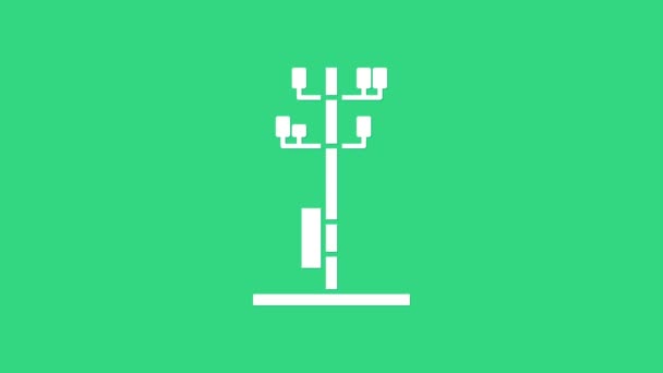 Witte elektrische toren gebruikt om een overhead power line icoon geïsoleerd op groene achtergrond te ondersteunen. Hoogspanningslijn. 4K Video motion grafische animatie — Stockvideo