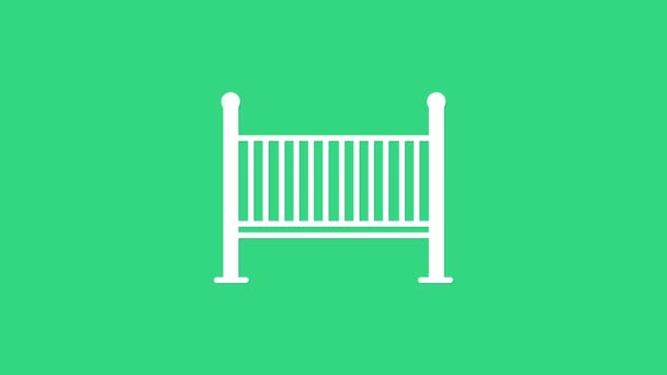White Baby wieg wieg bed pictogram geïsoleerd op groene achtergrond. 4K Video motion grafische animatie — Stockvideo