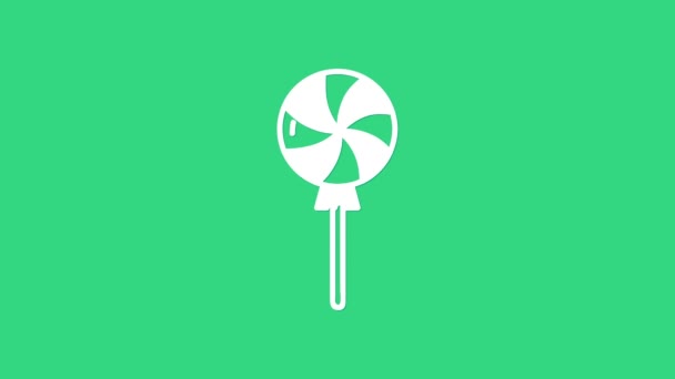 Icono de piruleta blanca aislado sobre fondo verde. Signo de caramelo. Comida, delicioso símbolo. Animación gráfica de vídeo 4K — Vídeos de Stock