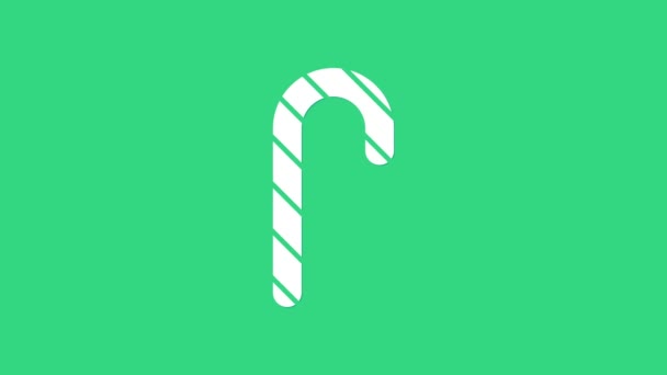 Bastón de caramelo blanco de Navidad con rayas icono aislado sobre fondo verde. Feliz Navidad y Feliz Año Nuevo. Animación gráfica de vídeo 4K — Vídeos de Stock