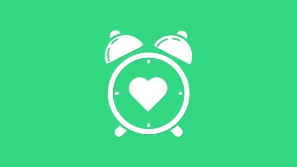 Weißes Herz in der Mitte Wecker-Symbol isoliert auf grünem Hintergrund. Valentinstag. 4K Video Motion Grafik Animation — Stockvideo