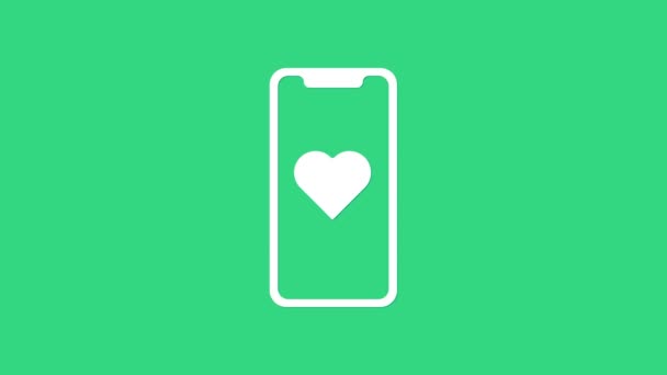 Teléfono móvil blanco con icono del corazón aislado sobre fondo verde. Día de San Valentín. Animación gráfica de vídeo 4K — Vídeos de Stock