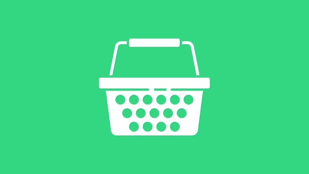 Bílý Nákupní košík ikona izolované na zeleném pozadí. Online nákupní koncept. Podpis doručovací služby. Symbol nákupního košíku. Grafická animace pohybu videa 4K