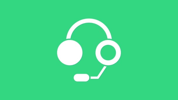 Icono de auriculares blancos aislado sobre fondo verde. Auriculares. Concepto para escuchar música, servicio, comunicación y operador. Animación gráfica de vídeo 4K — Vídeo de stock