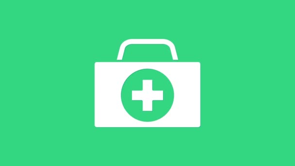 Ícone de kit de primeiros socorros branco isolado no fundo verde. Caixa médica com cruz. Equipamento médico de emergência. Conceito de saúde. Animação gráfica em movimento de vídeo 4K — Vídeo de Stock