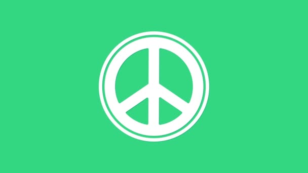 Weiße Friedensikone isoliert auf grünem Hintergrund. Hippie-Symbol für den Frieden. 4K Video Motion Grafik Animation — Stockvideo