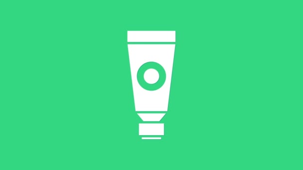 Vit kräm eller lotion kosmetiska röret ikon isolerad på grön bakgrund. Kroppsvårdsprodukter för män. 4K Video motion grafisk animation — Stockvideo