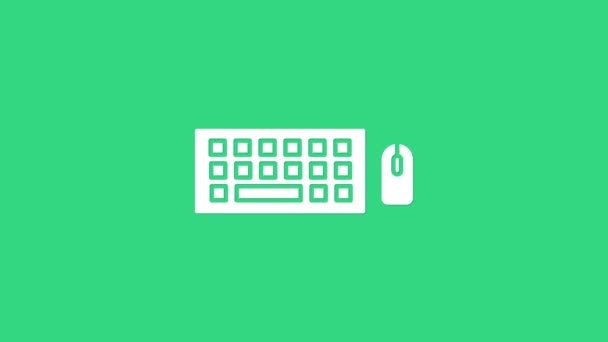 Vit dator tangentbord och mus ikon isolerad på grön bakgrund. PC-komponentskylt. 4K Video motion grafisk animation — Stockvideo
