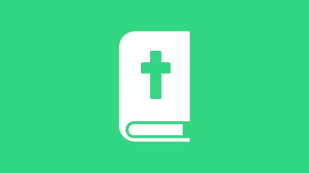 緑の背景に隔離された白い聖書の本のアイコン。4Kビデオモーショングラフィックアニメーション — ストック動画