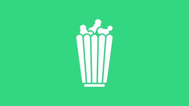 Pipoca branca no ícone da caixa de papelão isolado no fundo verde. Balde de pipoca. Animação gráfica em movimento de vídeo 4K — Vídeo de Stock