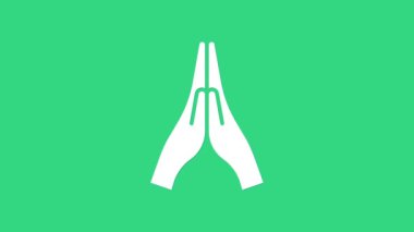 Beyaz Eller dua konumunda yeşil arka planda izole edilmiş bir simge. Tanrı 'ya inanç ve umutla dua edin. 4K Video hareketli grafik canlandırması