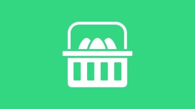 Yeşil arka planda paskalya yumurtası ikonu olan beyaz sepet. Mutlu Paskalyalar. 4K Video hareketli grafik canlandırması