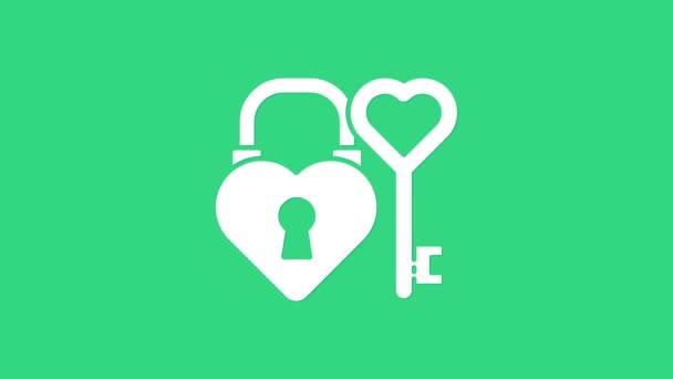Biały zamek w kształcie serca i klucz w kształcie serca ikona izolowane na zielonym tle. Symbol miłości i znak dziurki od klucza. 4K Animacja graficzna ruchu wideo — Wideo stockowe