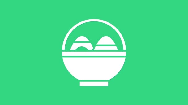 Panier blanc avec icône d'oeufs de Pâques isolé sur fond vert. Joyeux Pâques. Animation graphique de mouvement vidéo 4K — Video