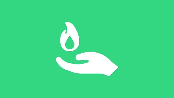 Mano bianca che tiene un'icona di fuoco isolata su sfondo verde. Animazione grafica 4K Video motion — Video Stock