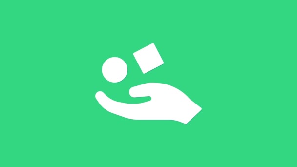 Bílá kostka levitující nad ruční ikonu izolované na zeleném pozadí. Levitační symbol. Grafická animace pohybu videa 4K — Stock video