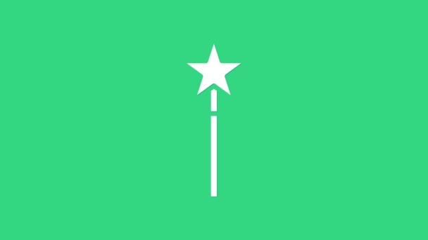 Icono de varita mágica blanca aislado sobre fondo verde. Accesorio mágico en forma de estrella. Poder mágico. Animación gráfica de vídeo 4K — Vídeo de stock