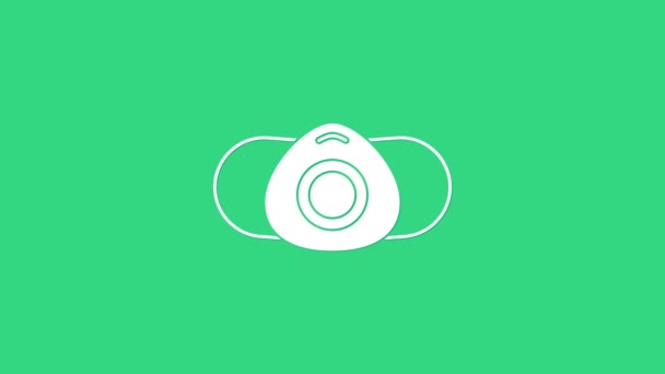 Icono de máscara protectora médica blanca aislada sobre fondo verde. Animación gráfica de vídeo 4K — Vídeo de stock