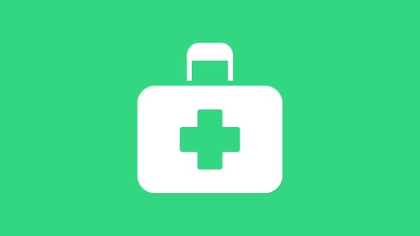Белый значок аптечки на зеленом фоне. Медицинская коробка с крестом. Медицинское оборудование для чрезвычайных ситуаций. Концепция здравоохранения. Видеографическая анимация 4K — стоковое видео