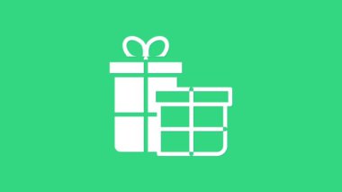 Yeşil arkaplanda beyaz hediye kutusu simgesi izole edildi. Mutlu Noeller ve mutlu yıllar. 4K Video hareketli grafik canlandırması