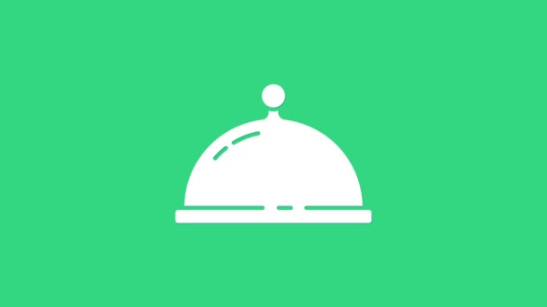 Λευκό Καλυμμένο με ένα δίσκο με εικόνες τροφίμων που απομονώνονται σε πράσινο φόντο. Δίσκος και καπάκι. Ρούχα εστιατορίου με καπάκι. Το σύμβολο της κουζίνας. 4K Γραφική κίνηση κίνησης βίντεο — Αρχείο Βίντεο
