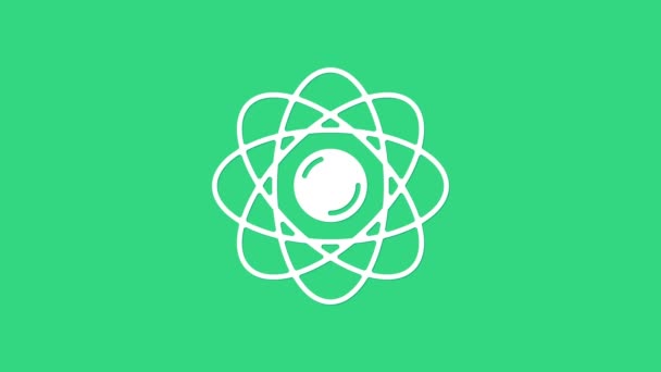 Vit Atom ikonen isolerad på grön bakgrund. Symbol för vetenskap, utbildning, kärnfysik, vetenskaplig forskning. 4K Video motion grafisk animation — Stockvideo