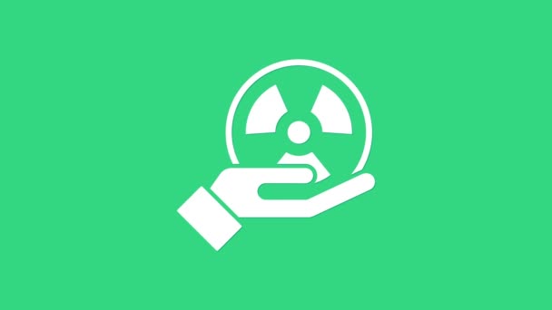 White Radioactive in hand icon isolated on green background. Radioactive toxic symbol. Radiation Hazard sign. 4K Video motion graphic animation — Stock Video