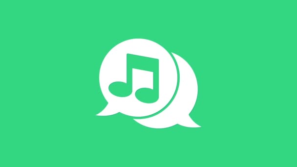Біла музична нота в піктограмі мовної бульбашки ізольована на зеленому фоні. Концепція музики та звуку. 4K Відео рух графічна анімація — стокове відео