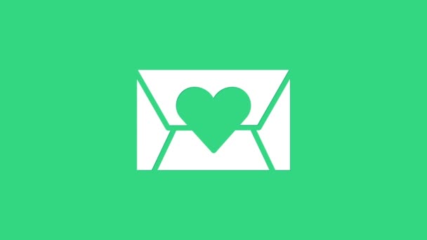 Fehér boríték Valentin szív ikon elszigetelt zöld alapon. Üzenetszeretet. Levél szerelem és romantika. 4K Videó mozgás grafikus animáció — Stock videók