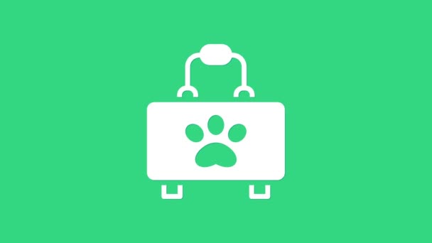 Bílé zvířátko první pomoc kit ikona izolované na zeleném pozadí. Otisk psí nebo kočičí tlapky. Klinická schránka. Grafická animace pohybu videa 4K