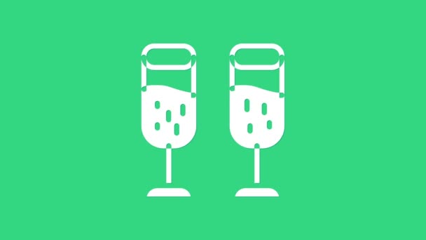White Glass of champagne icon isolated on green background. Merry Christmas and Happy New Year. 4K Video motion graphic animation — Stock Video
