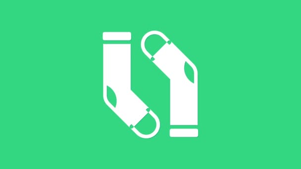 Fehér zokni ikon elszigetelt zöld alapon. 4K Videó mozgás grafikus animáció — Stock videók
