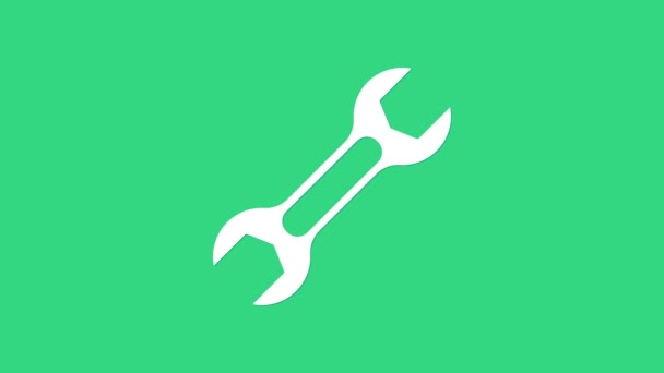 White Wrench spanner icon isolated on green background. 4K Video motion graphic animation — Stock Video