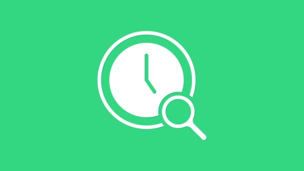 Hvidt forstørrelsesglas med ur ikon isoleret på grøn baggrund. Ur søgning. 4K Video bevægelse grafisk animation – Stock-video
