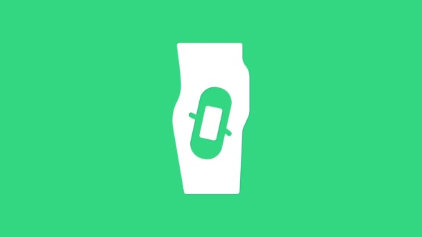 White Plaster on leg icon isolated on green background. 4K Video motion graphic animation — Stock Video