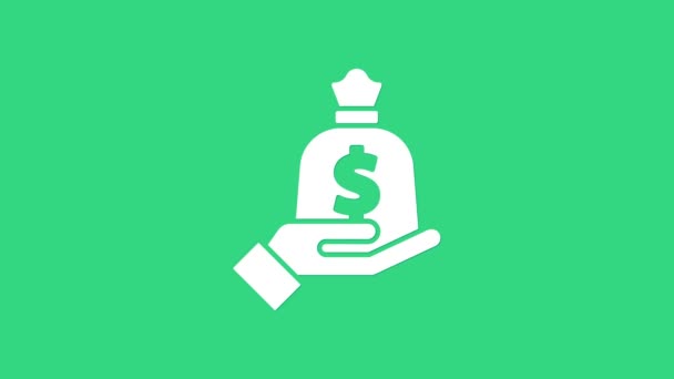 Mano bianca tenendo icona sacchetto di denaro isolato su sfondo verde. Dollaro o simbolo USD. Bancomat Banking segno di valuta. Animazione grafica 4K Video motion — Video Stock